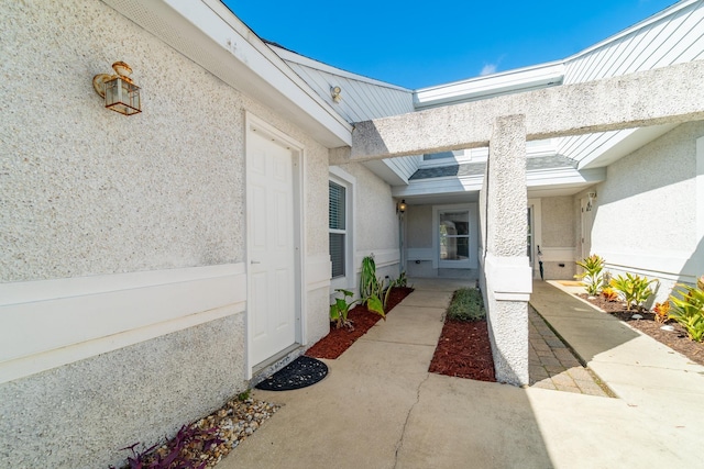 4602 Sandcastle Cir, Saint Augustine, FL 32084 - view of exterior entry with stucco siding