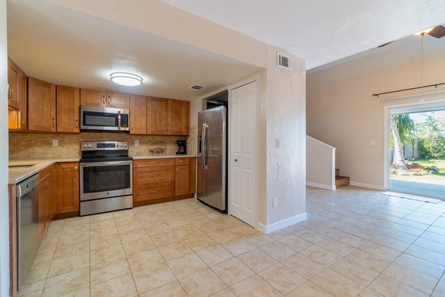 4602 Sandcastle Cir, Saint Augustine, FL 32084 - half bathroom with vanity, toilet, and a wainscoted wall