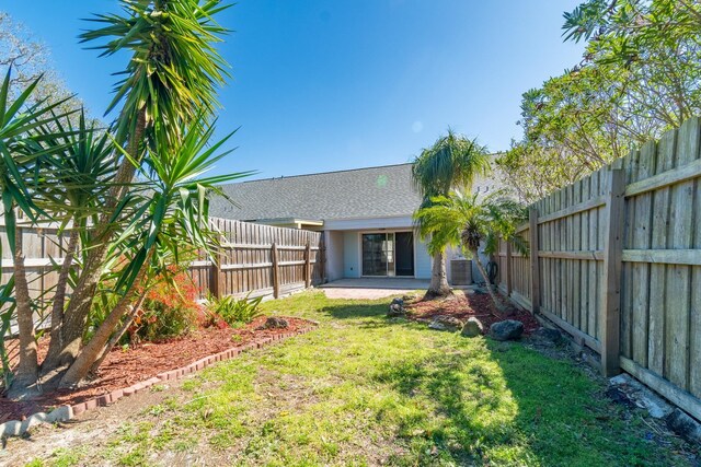 4602 Sandcastle Cir, Saint Augustine, FL 32084 - doorway to property featuring separate washer and dryer, fence, and stucco siding