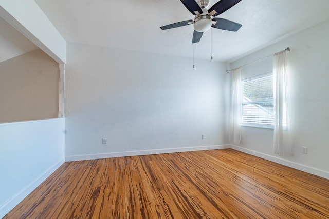 4602 Sandcastle Cir, Saint Augustine, FL 32084 - spare room featuring baseboards, a ceiling fan, and wood finished floors