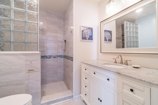 4602 Sandcastle Cir, Saint Augustine, FL 32084 - unfurnished bedroom featuring wood finished floors, a barn door, visible vents, connected bathroom, and baseboards