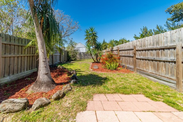 4602 Sandcastle Cir, Saint Augustine, FL 32084 - view of yard featuring a fenced backyard and a patio