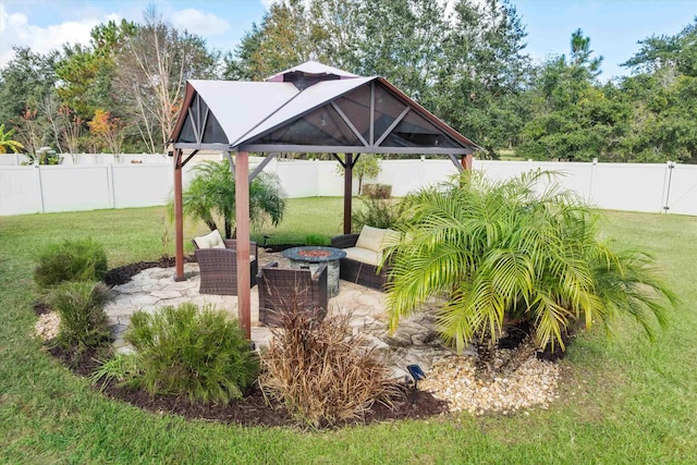 view of yard with a gazebo, a patio, an outdoor fire pit, and central air condition unit