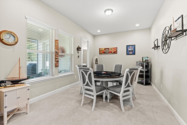 view of carpeted dining space