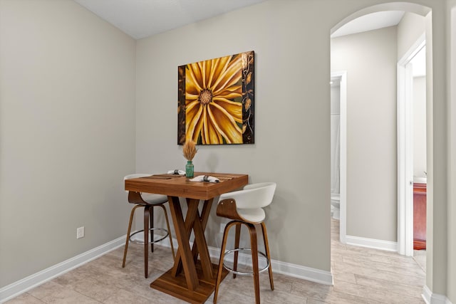 dining room with light wood-type flooring