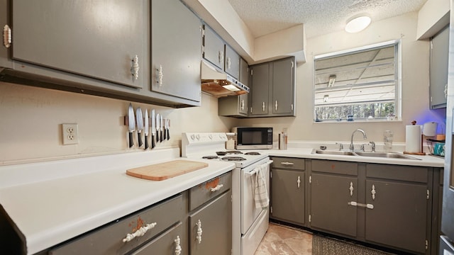 11519 W Confederate Dr, Glen Saint Mary, FL 32040 - kitchen with gray cabinetry, light countertops, a textured ceiling, white electric range, and a sink