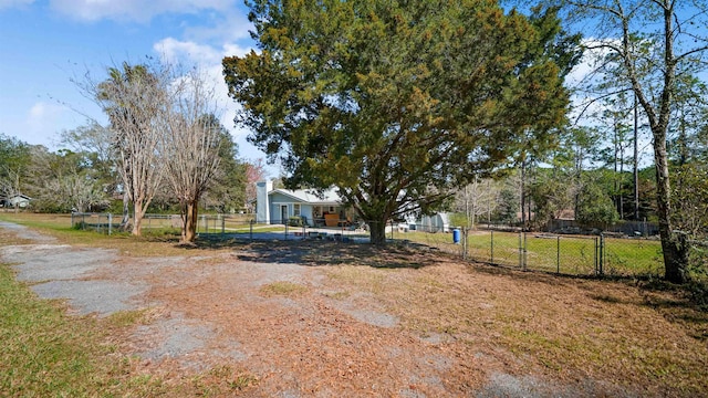 11519 W Confederate Dr, Glen Saint Mary, FL 32040 - view of yard featuring fence