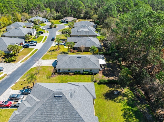 aerial view with a wooded view