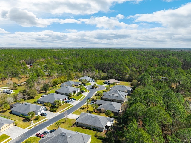 bird's eye view with a view of trees and a residential view