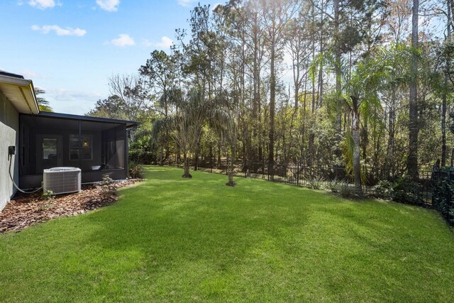 137 Cereus Ln, Saint Augustine, FL 32086 - view of yard featuring central air condition unit and a sunroom