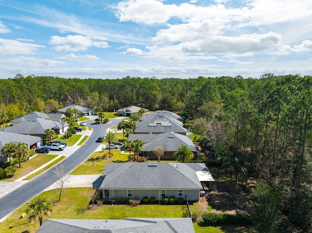 aerial view featuring a view of trees