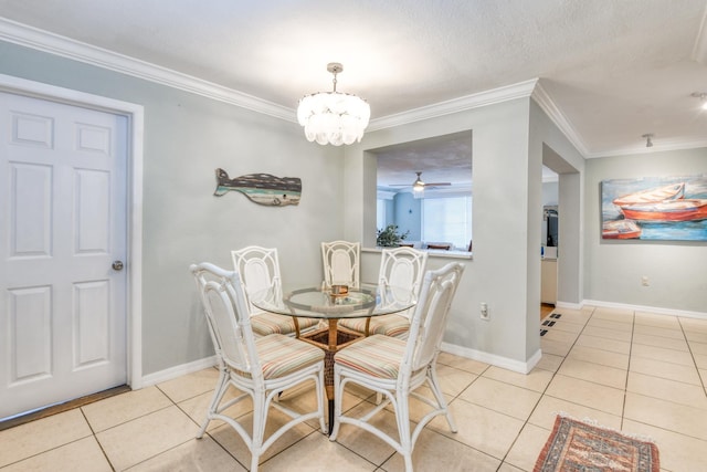 159 Southwind Dr, Saint Augustine, FL 32080 - dining area featuring light tile patterned floors, crown molding, a chandelier, and ceiling fan