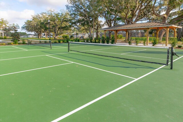 view of sport court with a gazebo