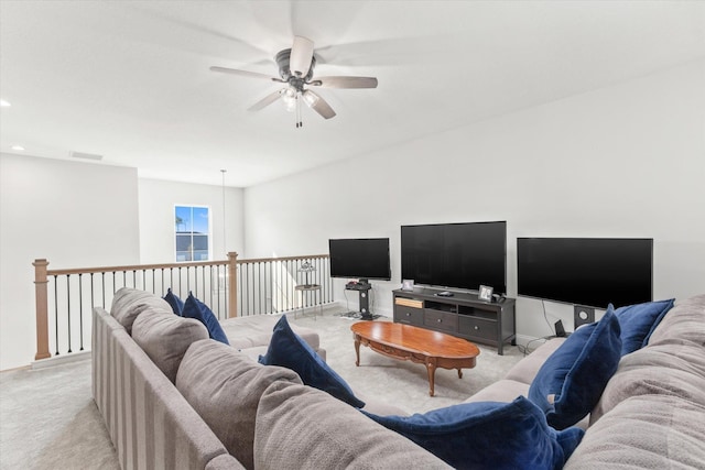 living room with light colored carpet and ceiling fan