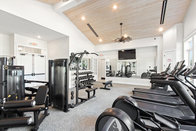 workout area with wood ceiling, light colored carpet, and high vaulted ceiling