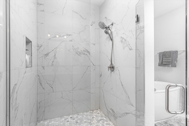 bathroom featuring an enclosed shower