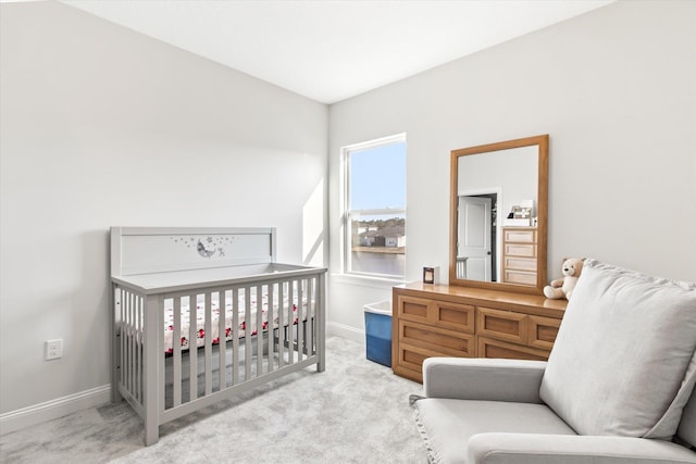 bedroom with light carpet