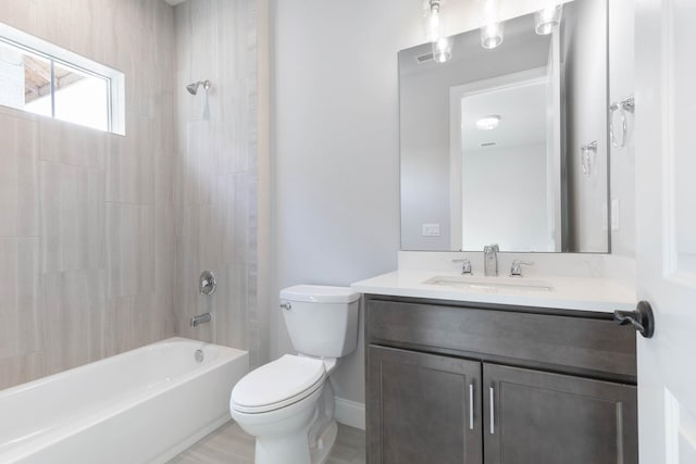 bathroom with  shower combination, vanity, baseboards, and toilet