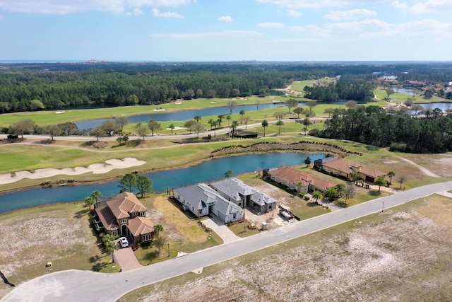 birds eye view of property featuring a residential view, view of golf course, and a water view