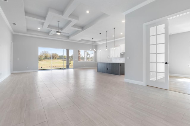 unfurnished living room with coffered ceiling, baseboards, a ceiling fan, and recessed lighting