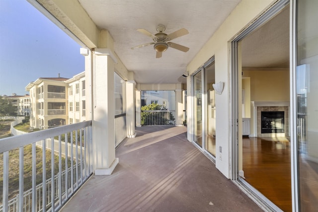 balcony featuring ceiling fan