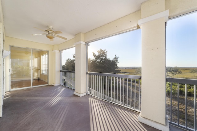 sunroom / solarium with ceiling fan