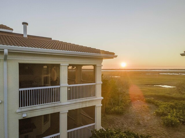 view of property exterior at dusk