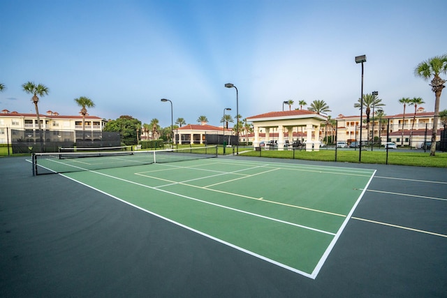 view of sport court with basketball hoop