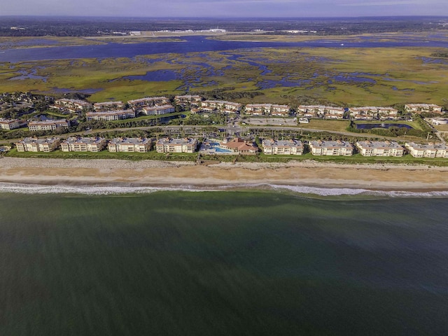 drone / aerial view with a view of the beach and a water view