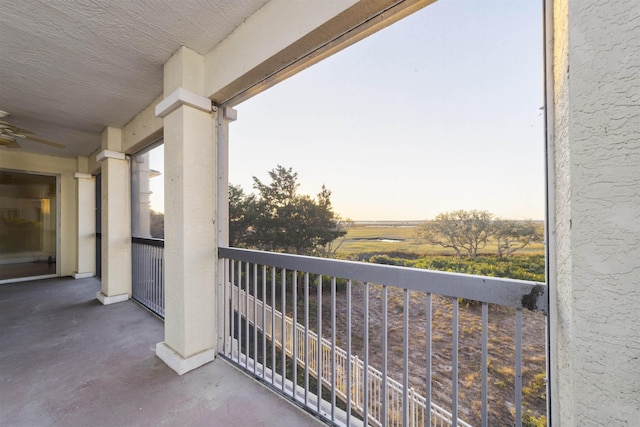 balcony featuring a rural view