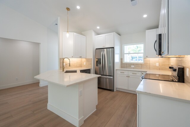 411 Royal Rd, Saint Augustine, FL 32086 - laundry room featuring laundry area, hookup for an electric dryer, hookup for a washing machine, light wood-type flooring, and baseboards