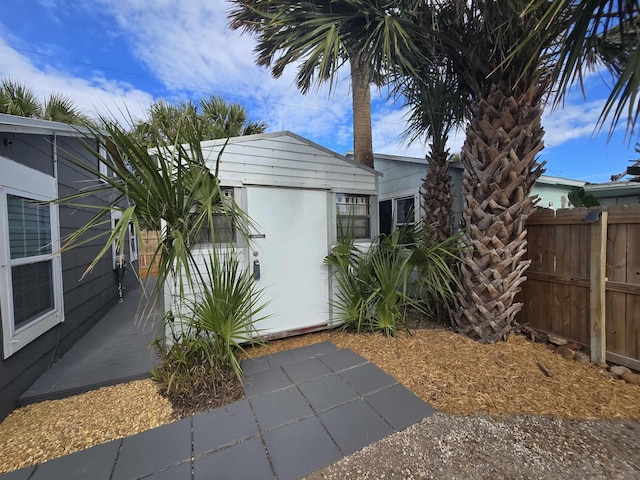 view of side of home with a patio