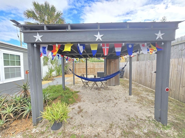 view of playground featuring fence