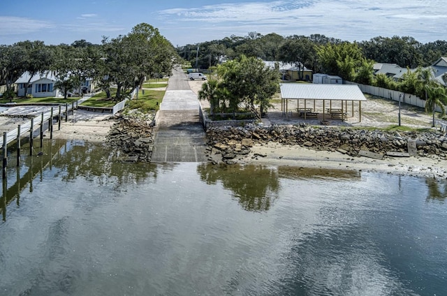 view of water feature with a gazebo and fence