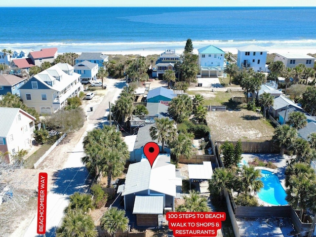 aerial view with a water view and a residential view