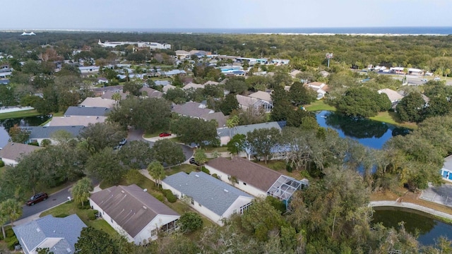 aerial view featuring a residential view and a water view