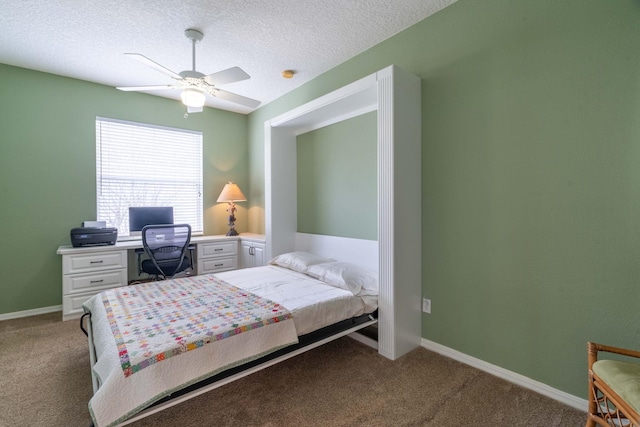 bedroom with ceiling fan, a textured ceiling, baseboards, and carpet flooring