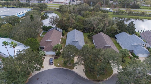 bird's eye view with a residential view and a water view