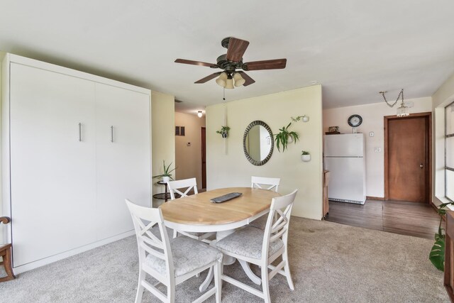 1300 Francis St, Saint Augustine, FL 32084 - dining area featuring light colored carpet, ceiling fan, and visible vents