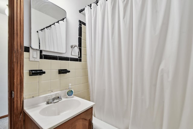 1300 Francis St, Saint Augustine, FL 32084 - bathroom with tile walls, vanity, and shower / bath combo