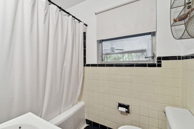 1300 Francis St, Saint Augustine, FL 32084 - full bath featuring a wainscoted wall, shower / bathtub combination with curtain, tile walls, and toilet