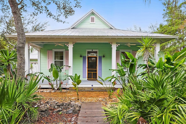 146 Istoria Dr, Saint Augustine, FL 32095 - view of front of property with metal roof and covered porch