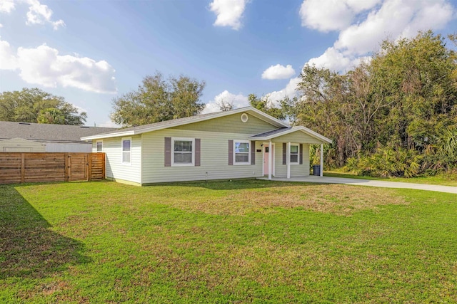 single story home with a front yard