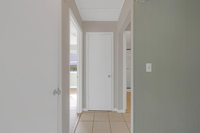 hallway with light tile patterned flooring