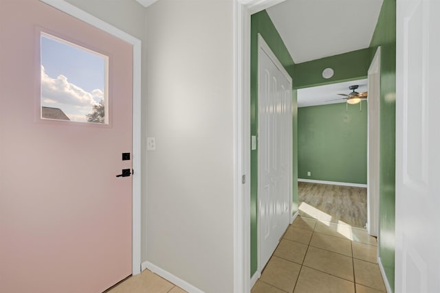 hallway with light tile patterned flooring