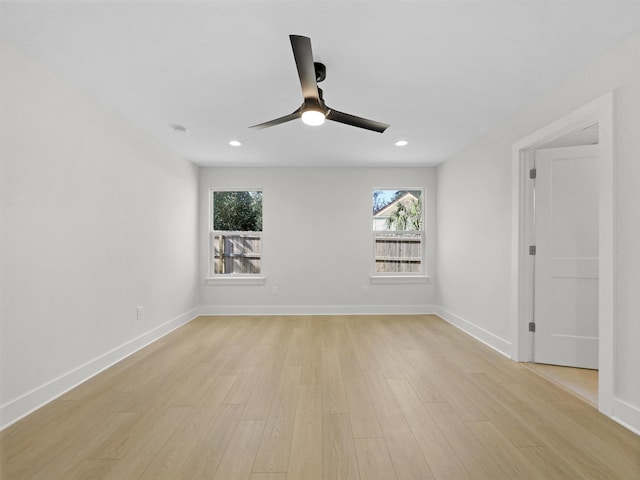 spare room with ceiling fan and light hardwood / wood-style flooring