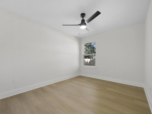 unfurnished room with ceiling fan and light hardwood / wood-style floors