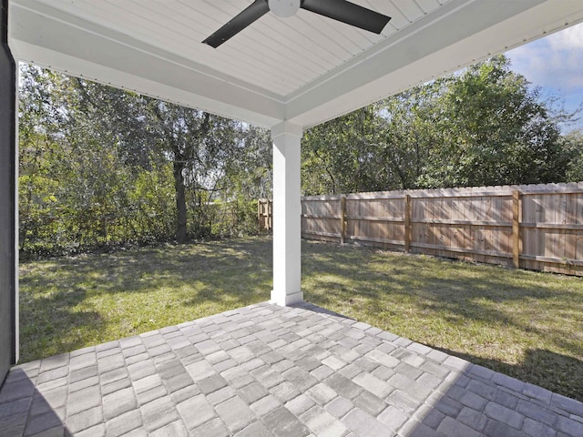 view of patio featuring ceiling fan