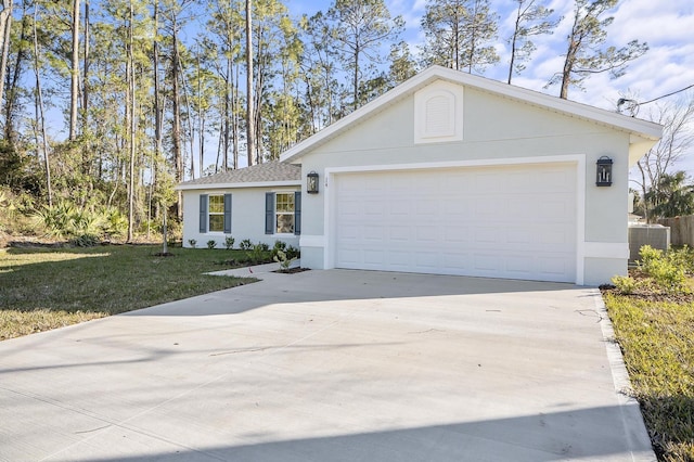 ranch-style home with a garage, central AC, and a front yard