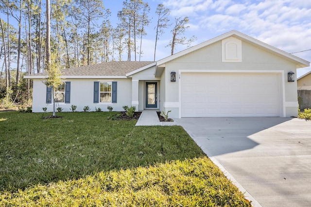 single story home featuring a garage and a front lawn